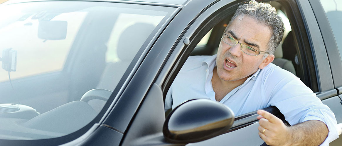 aggressive driver yelling out window