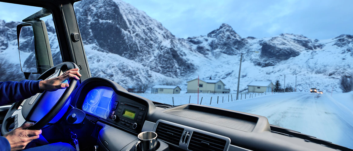 truck driving in snow